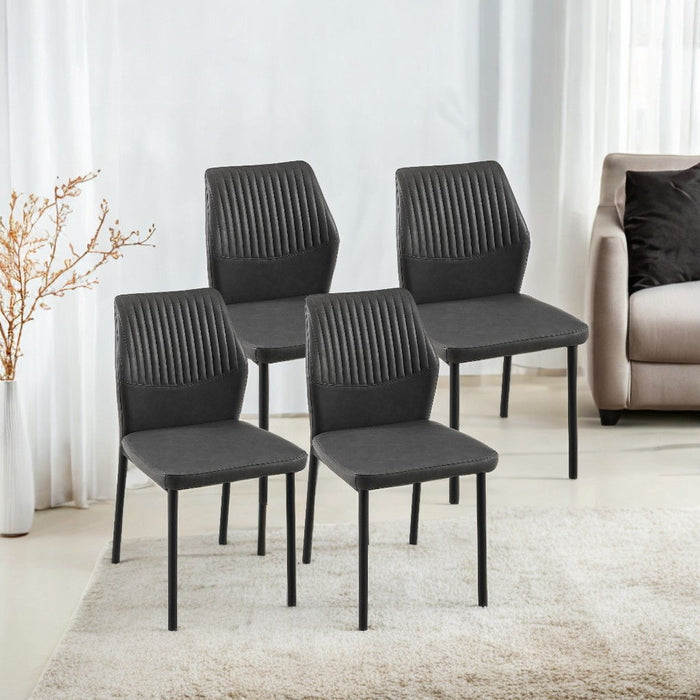 Set of Giga modern armless dining chairs with metal legs, perfect for living room or kitchen seating.