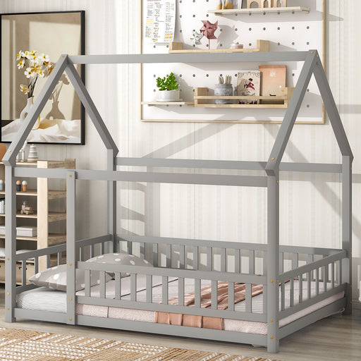 Wooden canopy bed with house roof frame and fence guardrails by Giga, featuring a sturdy wooden structure and cozy design.