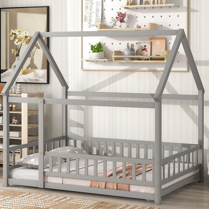 Wooden canopy bed with house roof frame and fence guardrails by Giga, featuring a sturdy wooden structure and cozy design.