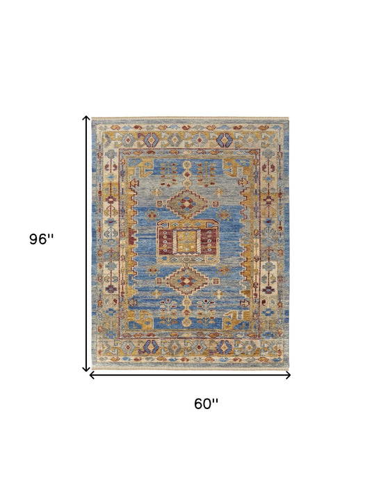5' x 8' Wool Geometric Hand Knotted Area Rug With Fringe - Blue Red And Yellow