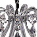 HomeRoots Empire eight-light chandelier with transparent glass candle-style fixtures in nickel finish and ivory accents.