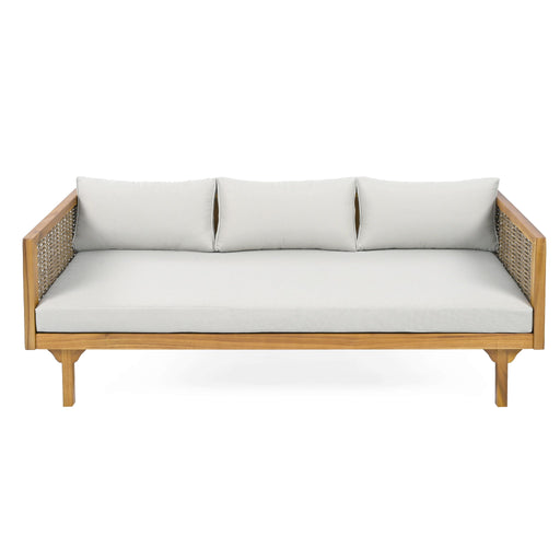 Giga Claremont 3-seater teak daybed with rattan arms, featuring a stylish and comfortable outdoor lounge design.