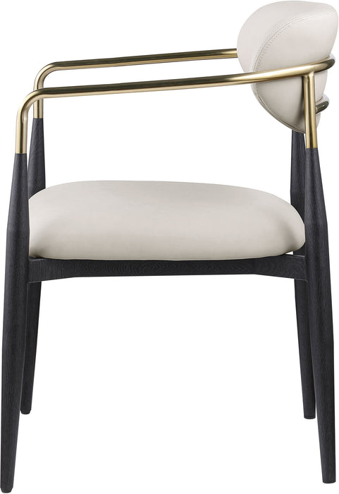 Black-legged vegan leather upholstered dining arm chair by Meridian Furniture, showcasing a stylish and comfortable seating design.