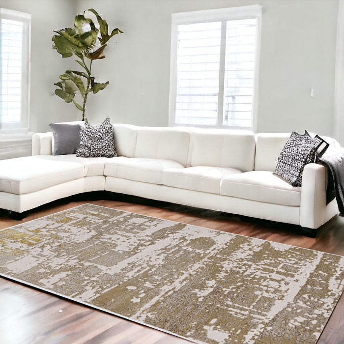 10' x 13' Machine Woven Abstract Indoor Area Rug - Ivory Gold