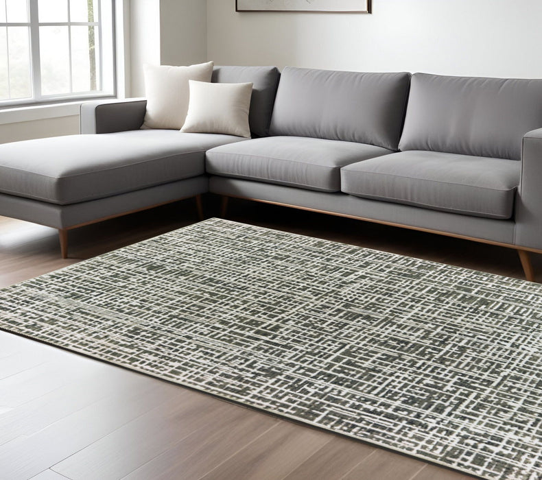 6' x 9' Abstract Power Loom Stain Resistant Area Rug - Gray And Ivory