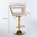 Set of two Giga modern bar stools with iron tube legs, soft cushions, and comfortable backrests.