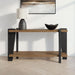 Signature Design by Ashley Weathermore rectangular cocktail table with a modern design, showcasing a sleek wooden surface and sturdy legs.