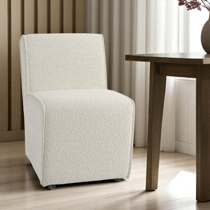Fully Upholstered Boucle Dining Side Chair With Wheels - Cream