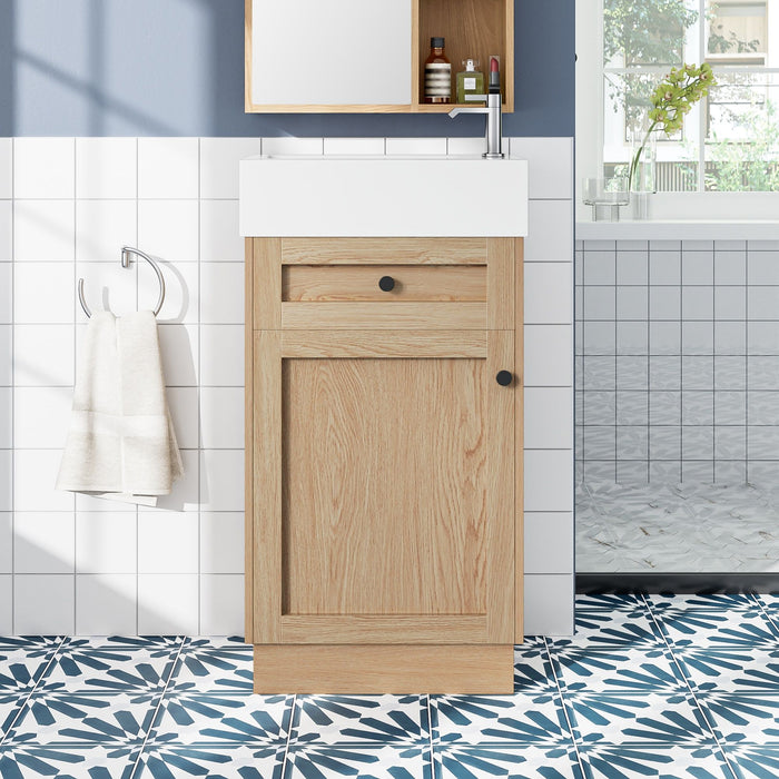 Giga wood bathroom vanity with reversible resin sink, cabinet, and zinc alloy handles, showcasing the sleek design and natural finish.