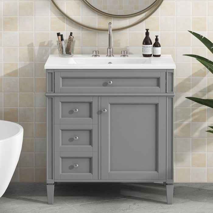 Giga bathroom vanity with top sink, storage cabinet, two drawers, and tip-out drawer for organized bathroom storage