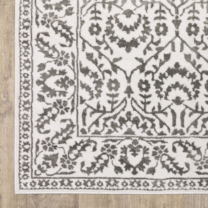 8' x 11' Floral Power Loom Stain Resistant Area Rug - Gray And White