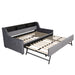 Dark gray Giga twin size daybed with trundle, LED light, and charging station, featuring storage beds design.