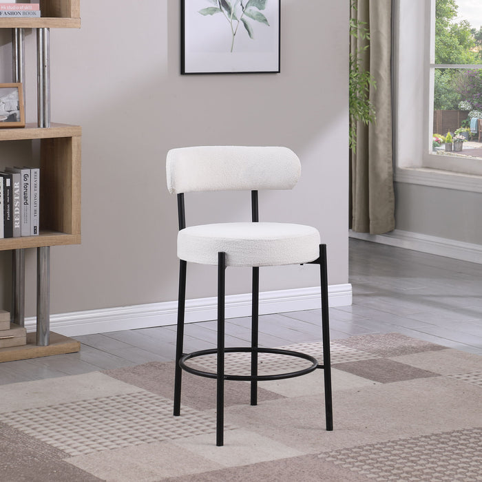 Set of two Giga modern Sherpa counter height barstools with brushed brass legs, low back, footrest, and upholstered seats for kitchen dining.