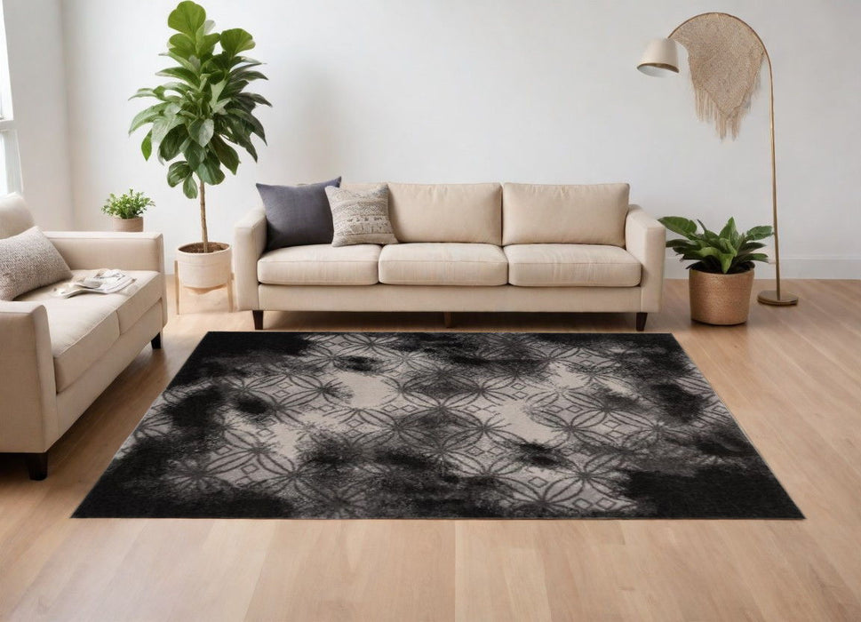 8' x 11' Abstract Power Loom Stain Resistant Area Rug - Black
