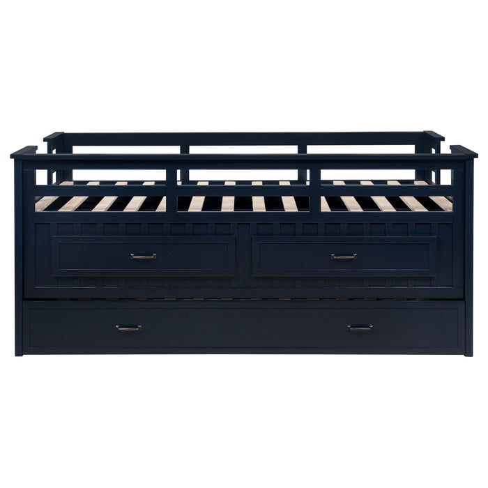 Carlsbad Wood Twin Captains Bed with Trundle in navy blue, featuring a sturdy wooden frame and built-in storage drawers.