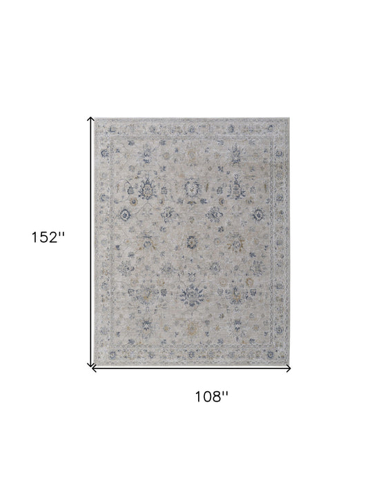9' x 13' Floral Power Loom Worn Faded Area Rug With Fringe - Ivory Taupe And Blue