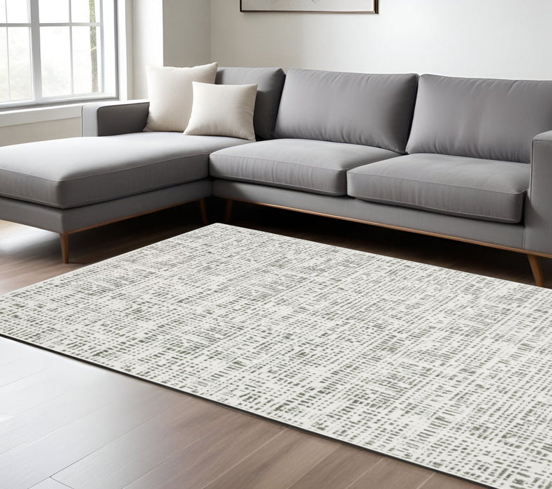 7' x 10' Abstract Power Loom Area Rug - White And Gray