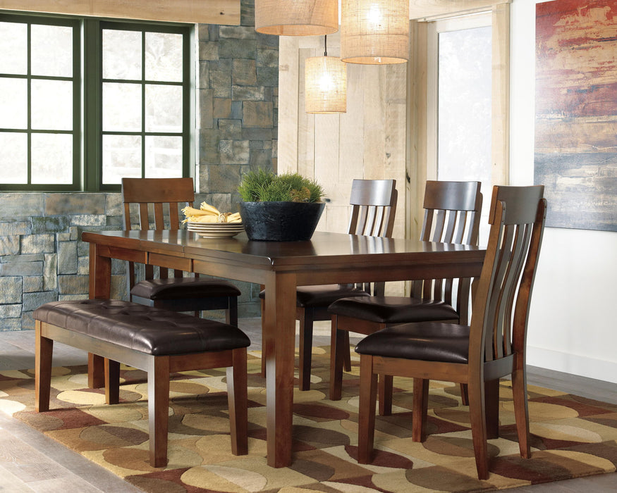 Ashley Furniture Ralene upholstered bench with plush fabric and wooden legs, ideal for entryways or bedroom seating.