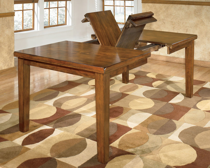 Signature Design by Ashley Ralene dining room counter table with a sleek wooden surface and sturdy legs.