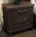 Dark brown Vonitta Bay two-drawer nightstand with built-in charging station and sleek design, from Signature Design by Ashley.