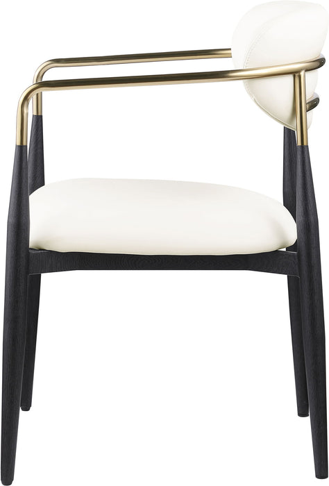 Black-legged Meridian Furniture Ronda vegan leather upholstered dining arm chair with plush seat and backrest.