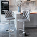 Set of two Giga modern upholstered swivel barstools with adjustable height, tufted backs, and comfortable seats for home or kitchen use