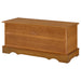 CoasterEssence Paula Cedar Chest in honey finish, showcasing a classic wooden furniture piece with detailed craftsmanship and warm tone.