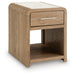 Signature Design by Ashley rectangular cocktail table with a sleek top and sturdy legs, ideal for living room or lounge areas.