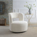 Giga swivel chair with round barrel shape, soft teddy fabric, perfect for living room seating and modern interior decor.