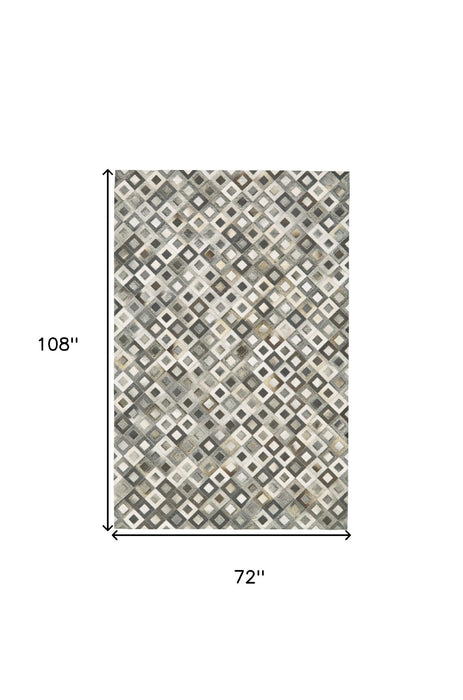 6' x 9' Faux Cowhide Animal Print Power Loom Area Rug - Black Gray And White