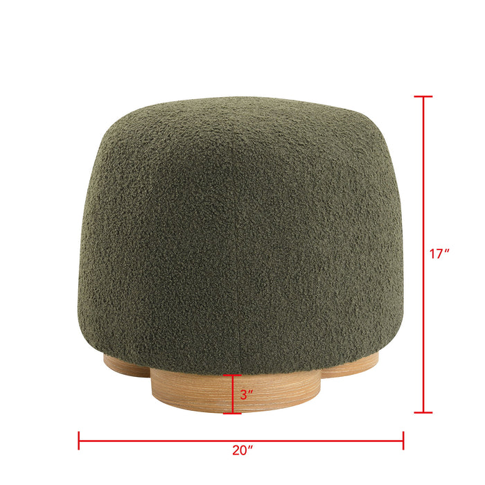 Giga round soft teddy fabric upholstered ottoman with metal accents, serving as a stylish stool or footrest.