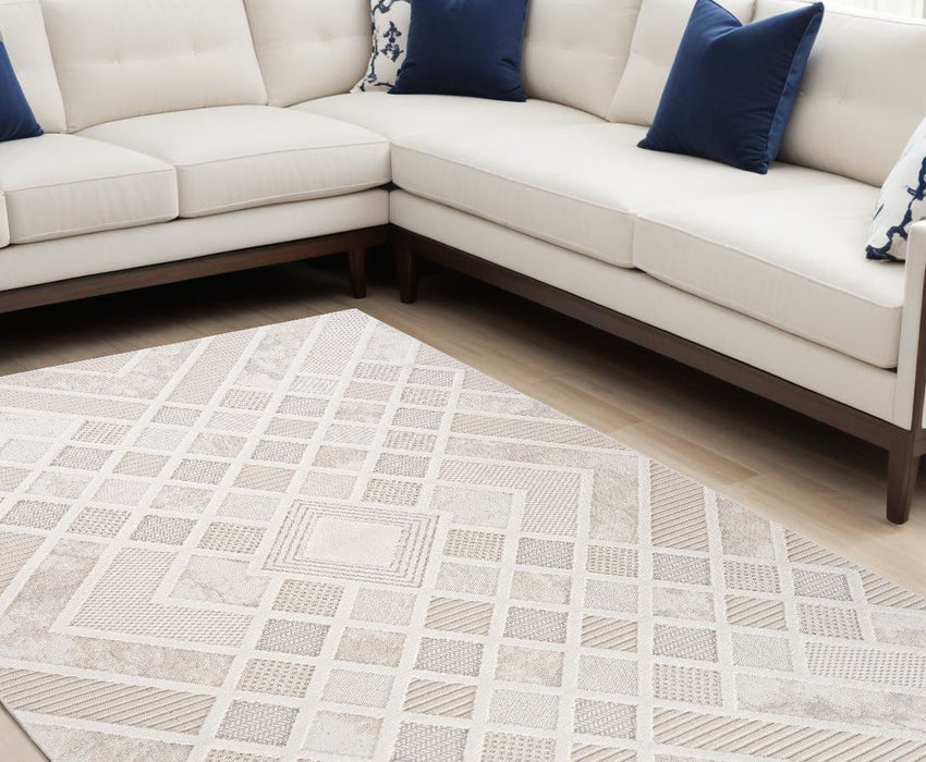 8' x 11' Abstract Distressed Polyester Area Rug - Cream And Beige