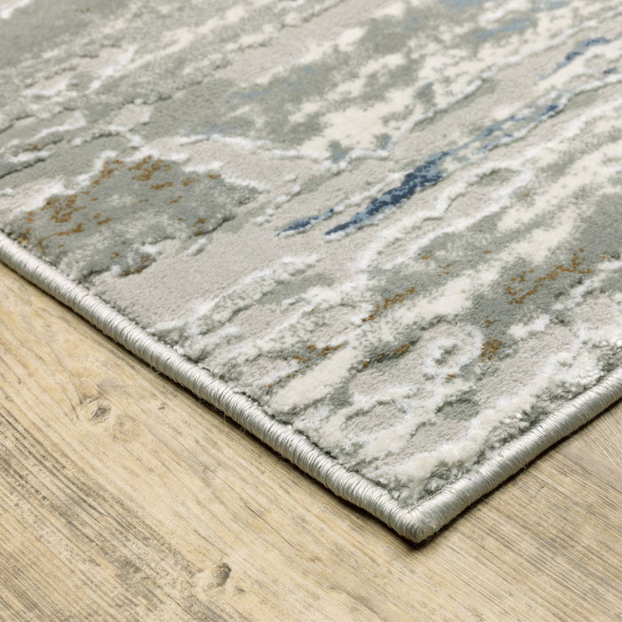10' x 13' Abstract Power Loom Stain Resistant Area Rug - Blue Ivory Gray Light Blue And Brown