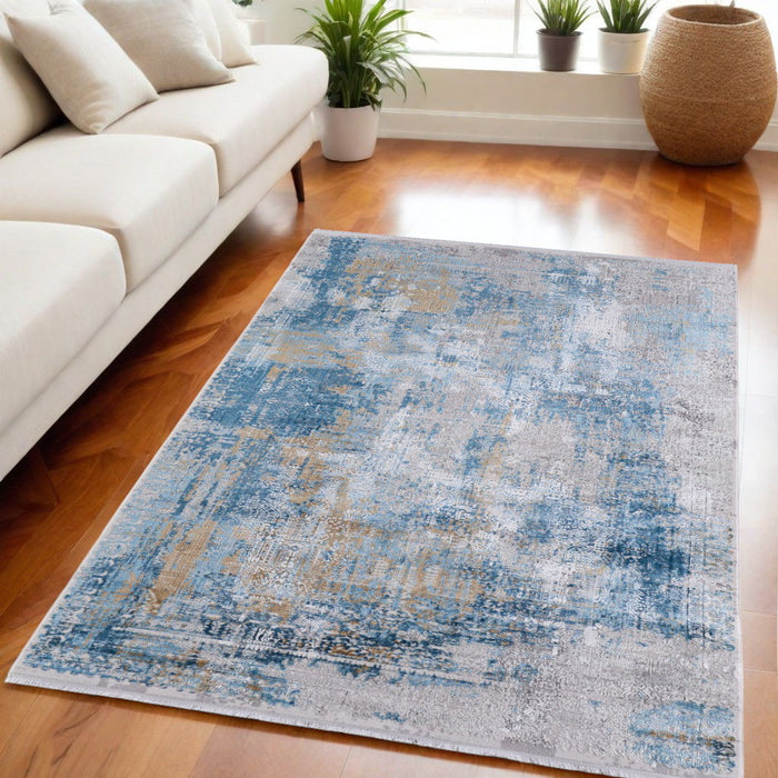 5' X 8' Abstract Power Loom Area Rug With Fringe - Blue