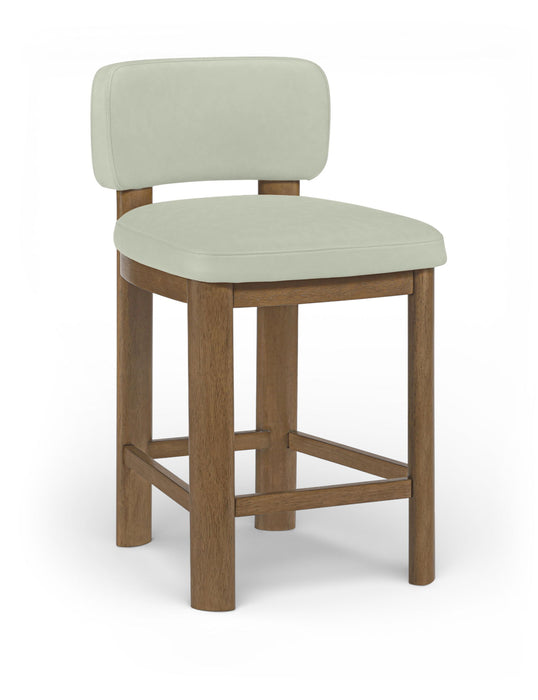 Set of two Meridian Furniture Paloma faux leather counter stools with brown frames, featuring upholstered seats and modern design.