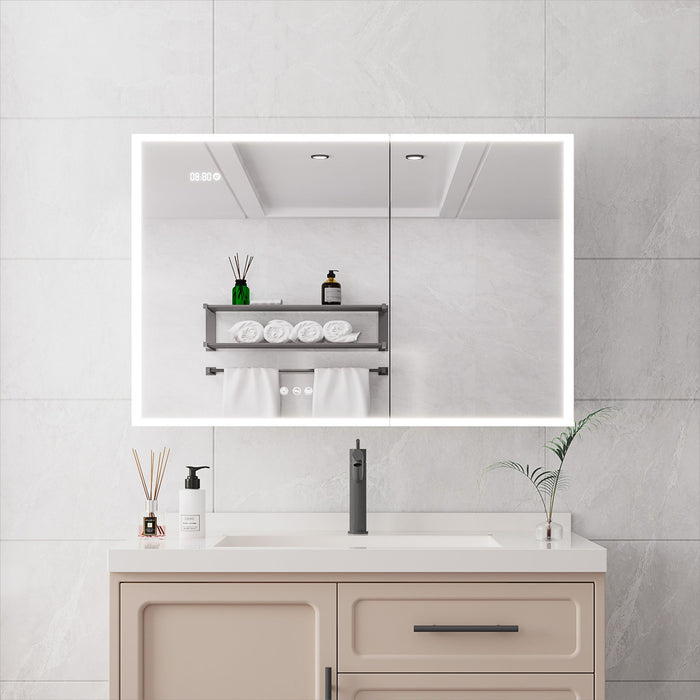 Giga bathroom medicine cabinet with built-in LED lights, mirror, and defogger, mounted on a bathroom wall.