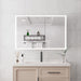 Giga bathroom medicine cabinet with built-in LED lights, mirror, and defogger, mounted on a bathroom wall.