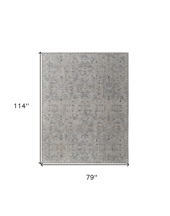 7' x 10' Abstract Power Loom Worn Faded Area Rug With Fringe - Ivory Tan And Blue