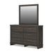 Vonitta Bay six-drawer dresser by Signature Design by Ashley in a warm wood finish