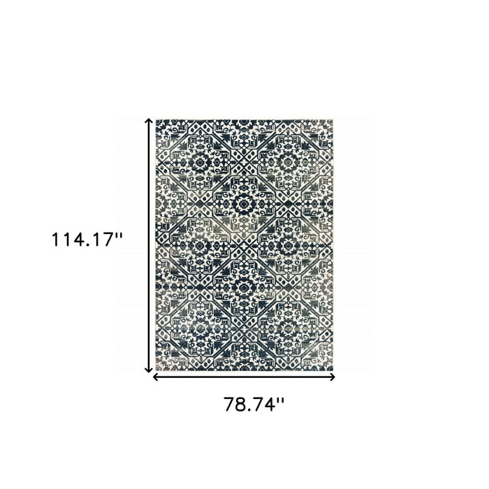 6' x 9' Geometric Power Loom Stain Resistant Area Rug - Navy And Ivory