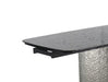 NORA modern extendable dining table by Chintaly with gloss black textured glass top and stainless steel base, shown fully extended.