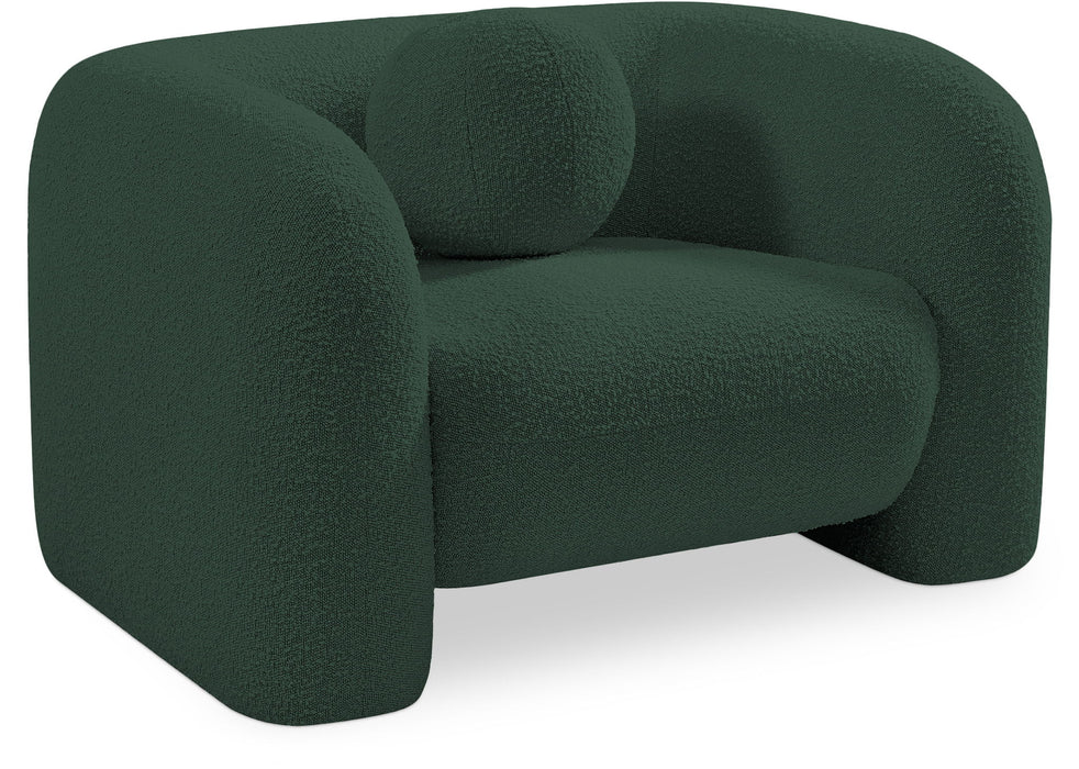 Modern Emory arm chair by Meridian Furniture with plush fabric upholstery and wooden legs, perfect for living room seating.