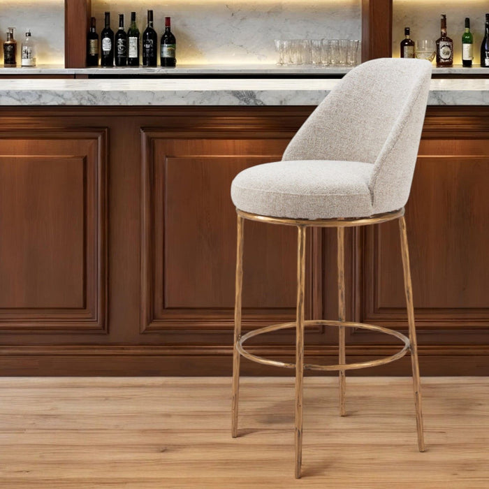 Beige fabric and gold steel swivel bar chair with a 28-30 inch height, modern design, suitable for home or bar seating.