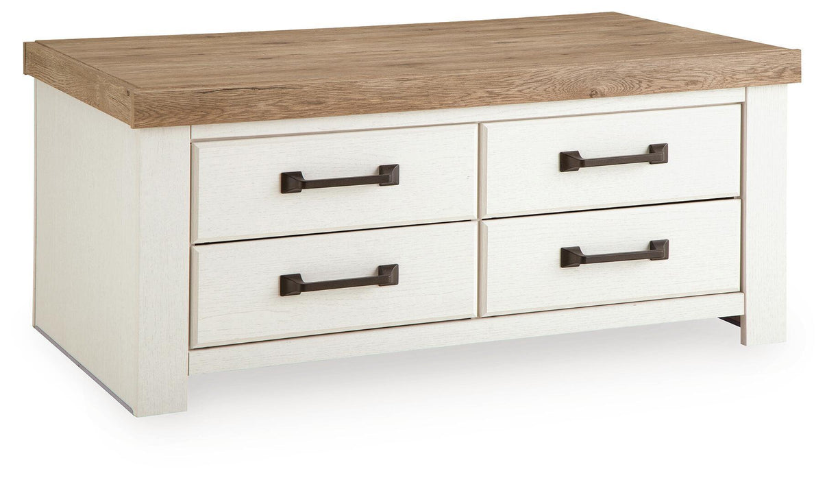 Signature Design by Ashley rectangular cocktail table with a sleek wooden top and modern metal legs.