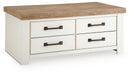 Signature Design by Ashley rectangular cocktail table with a sleek wooden top and modern metal legs.