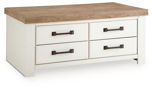 Signature Design by Ashley rectangular cocktail table with a sleek wooden top and modern metal legs.