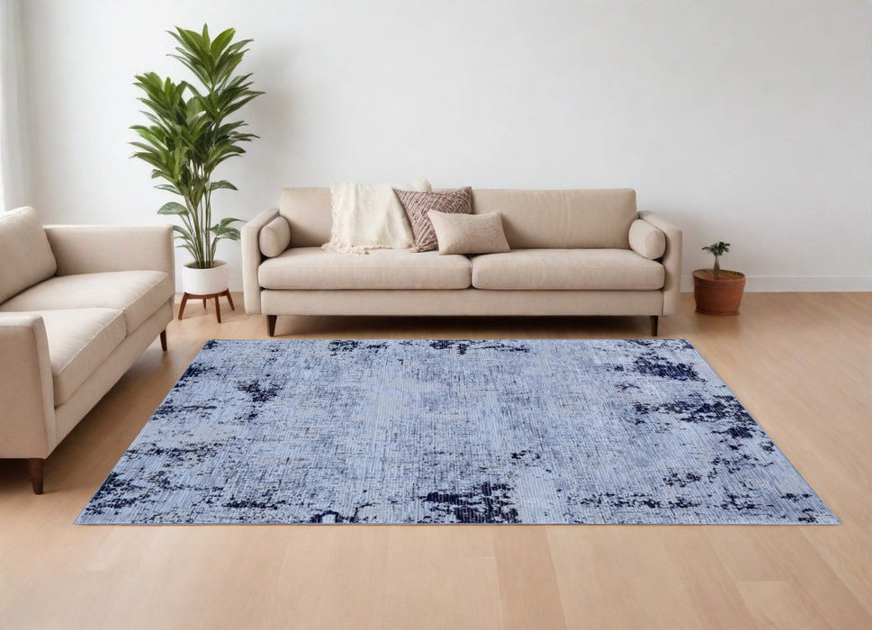 7' x 10' Abstract Power Loom Area Rug - Light Blue And Black