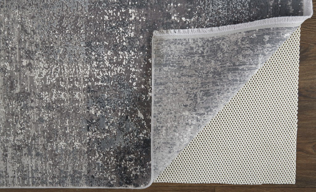 7' x 10' Abstract Power Loom Distressed Area Rug With Fringe - Gray Black And Silver