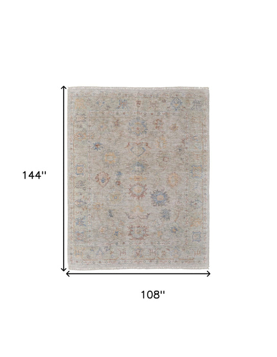 9' X 12' Floral Hand Woven Distressed Area Rug With Fringe - Tan