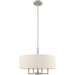 HomeRoots 23-inch metal chandelier with four lights, dimmable, featuring cream shades and nickel finish.